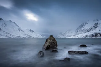 Photo art by Sebastian Worm: snow-covered mountains and fjord in Norway