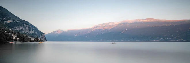 Photo art by Dennis Wehrmann: panoramic view of sunset over Lake Garda.