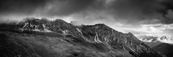 Panorama photo by Dennis Wehrmann: snow-covered mountains and clouds over Rosskopf