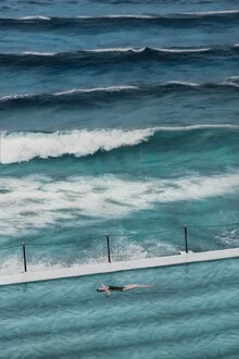 Photo art by AJ Schokora: Swimmer in calm water at Bondi Beach, conveying a peaceful mood.