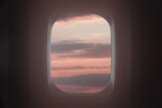 Beautiful photo art with a view of the horizon and clouds from an airplane window.