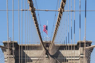 Photo art by AJ Schokora: Brooklyn Bridge with gentle clouds in the background