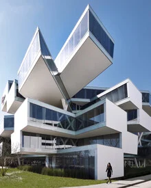 Photo art by Roc Isern: modern building with pedestrian in a calm urban atmosphere