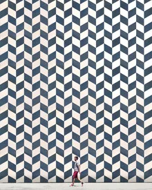 Patterned wall with geometric shapes, creating a calm atmosphere.