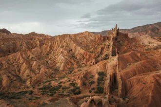 Bizarre rocky landscape in Kyrgyzstan at sunset