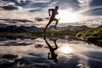 Photo art by Jordi Saragossa: Kilian Jornet trail running in the mountains