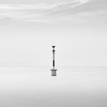 Black-and-white photo by Ernst Pini: lighthouse in serene Adriatic setting