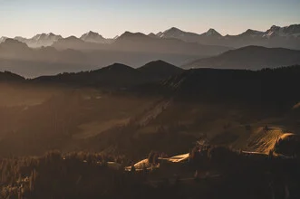 Photo art by Kerstin Maier: calm mountain range at sunset in Switzerland