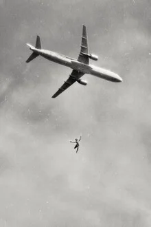 Photo art by Jonas Loose: plane gently falling through clouds in a monochrome style