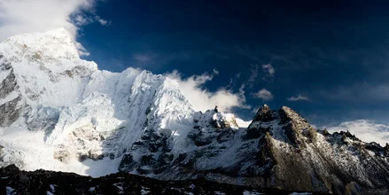 Photo art by Michael Wagener: majestic Nuptse peaks with clouds in the Himalayas