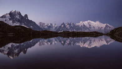 Beautiful landscape featuring Mont Blanc in the background with gentle hills.