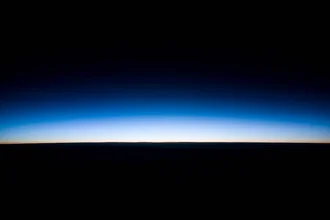 Photo featuring blue lines depicting a sky above the clouds