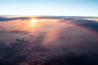 Photo art by Inflight Galerie: gentle sunrise above clouds