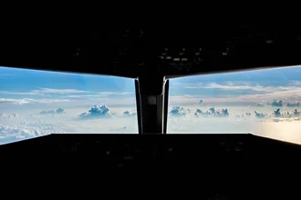 Photo art by Inflight Galerie: View from an airplane window of clouds and sky