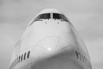 Photo art by Inflight Galerie: detailed airplane soaring in the sky