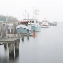 Photo art by Dennis Wehrmann: fishing boats on the Baltic Sea in soft fog