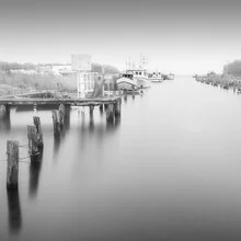 Photo art by Dennis Wehrmann: calm harbor in mist with fishing boats