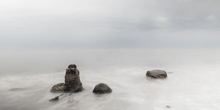 Photo art by Michael Schulz-dostal: three stones by the calm Baltic Sea waters