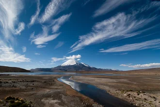 Photo art by Mathias Becker: view of the majestic Parinacota volcano in Bolivia.