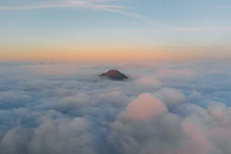 Photo art by Sebastian ‚zeppaio' Scheichl: island in a sea of clouds at sunrise