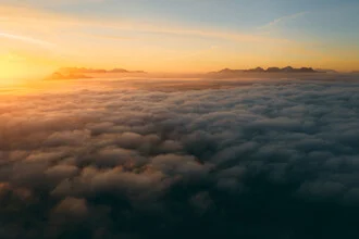 Photo art by Sebastian ‚zeppaio' Scheichl: sea of clouds over mountains at sunrise.