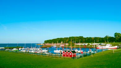 Photo art: calm view of a small harbor at the North Sea with soft colors.