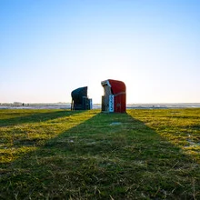 Photo art: Beach chairs at the North Sea under a clear sky