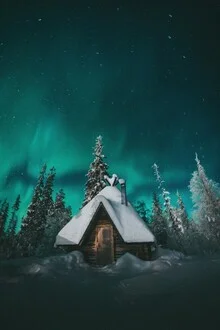 Photo art by Patrick Monatsberger: Northern lights over snowy landscapes in Finland