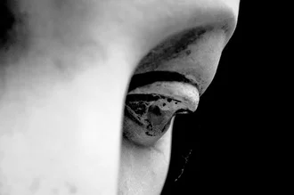 Photo art by Gerhard Blücher: melancholic sculpture in a cemetery