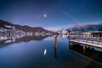 Photo art by Franz Sussbauer: Moon over Lake Tegernsee in winter with clear reflection.