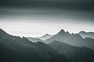 Black and white photo art: calm mountain landscape of the Lofoten Islands in Norway.