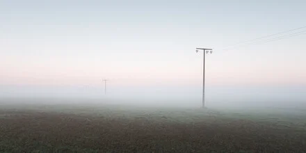 Photo art by Thomas Wegner: power poles in fog, autumn mood over a field