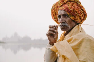 Portrait of a man in India wearing a traditional turban, showcasing warm colors.