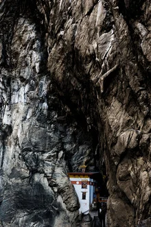 Photo art by Michael Wagener: Prayer house in Bhutan, surrounded by majestic mountains.
