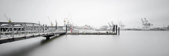 Photo art by Dennis Wehrmann: Hamburg harbour view with gentle waves and bridge at sunset