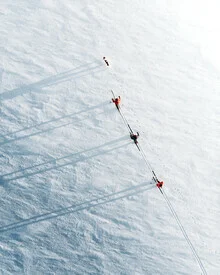 Photo art by Daniel Öberg: skier in a wintry coastal landscape at sunset