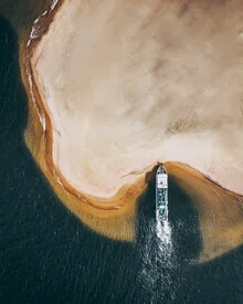 Photo art by Daniel Öberg: serene view of a Swedish beach with a boat