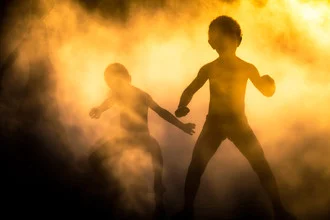 Photo art by Thomas Lhomme: Children reflected in yellow water in Bordeaux.