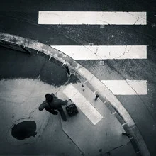Wall art featuring a zebra crossing on a city street in Bordeaux, France.