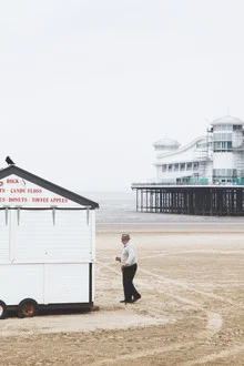 Photo art by Bernadette Jedermann: old man at the beach with gentle waves in the background