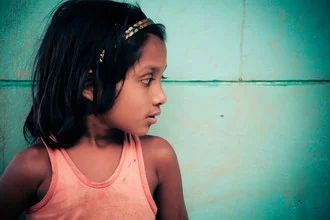 Photo art by Robinson Crusius: girl in front of a traditional house in Coxs Bazar.