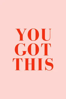 Wall art featuring playful typography in pink, radiating motivation.
