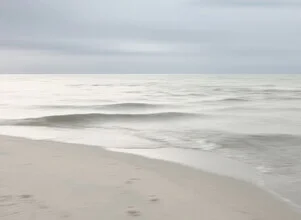 Photo art by Lena Weisbek: calm seascape with beige sand and gentle waves.